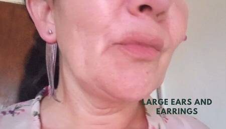 Large ears and earrings