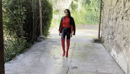Kahina in leather pants and boots