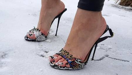 Nando Muzi on ice, slippery high heels, high heels on ice, sliding high heels on ice, high heels on snow