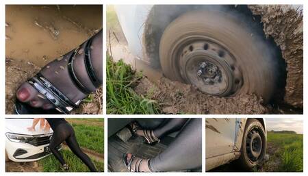 PREMIRE: Sexy Julia is in serious trouble: spinning wheels and deep mud stuck