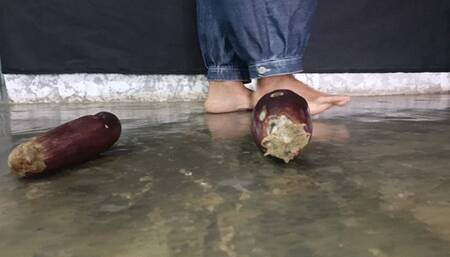 Bare feet of man crush and trample fruit (6)