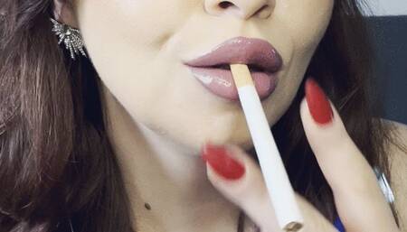 Chain smoking red malrboro cigarette