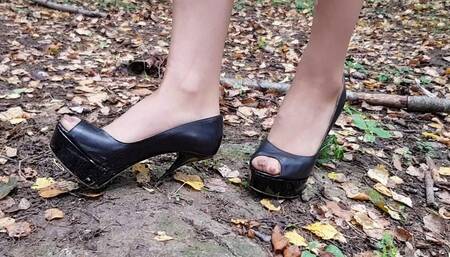 high heels forest walk, high heels sinking in ground, high heels stuck, bending high heels