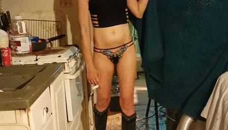 Rocking those sexy boots while smoking two cigarettes