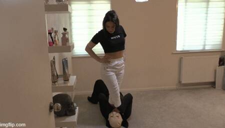 On the Floor, Between Her Feet