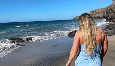 Beach pee in blue dress