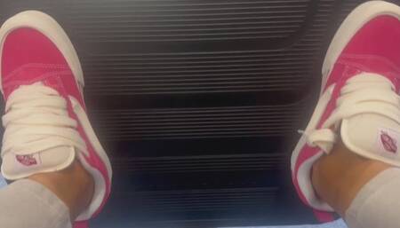 Red van sneakers on leg press @ gym