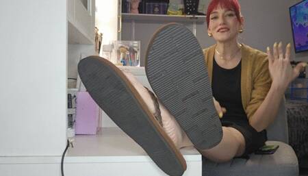 An old friend can't help but tickle my feet while I am trying not to laugh on the phone with my boss