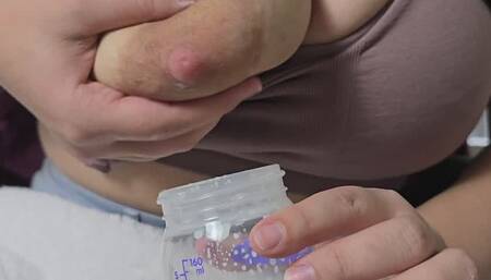 Mommy Talk and Hand Expressing Breastmilk into Cup