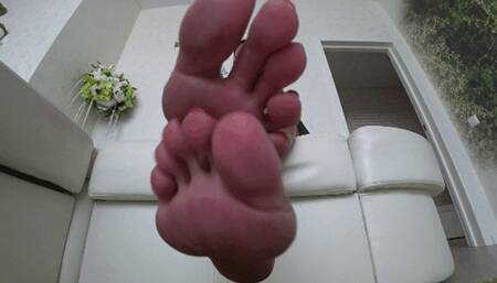 I will jerk you off and you will cum on my feet aa