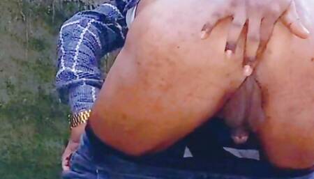 Femboy Piss and Flash Her Hot Feminized Body Outdoor Piss While in Chastity Cage and Rub Her Small Flaccid Cock