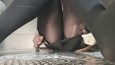 Pissing with my stockings on, then I stuff them inside my cunt