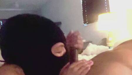 Cinnamon buries her head in Tony Waffles' lap and gets to work worshiping his balls