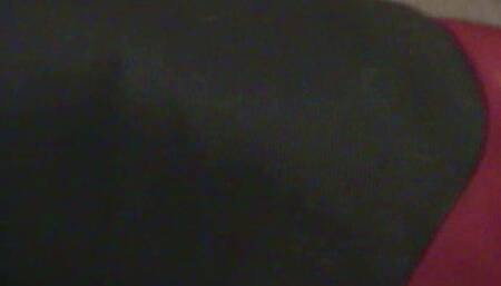 Red Pumps Dipping In Black Hose