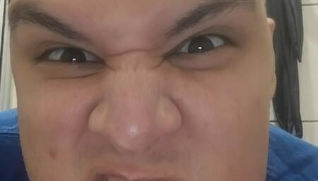 Making silly scary faces on the toilet