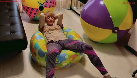 Alla quickly deflates three large beach balls