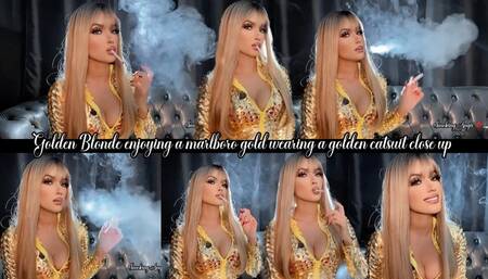 Golden Blonde enjoying a marlboro gold wearing a golden catsuit close up