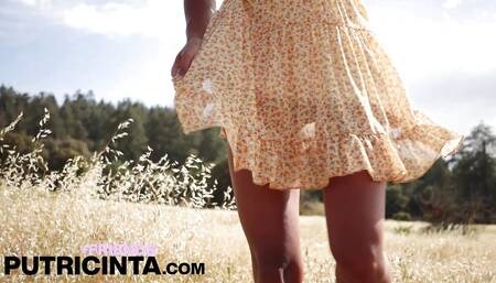 Sexy Putri Cinta Lounges in the Grass, Confidently Showing Off Her Pussy