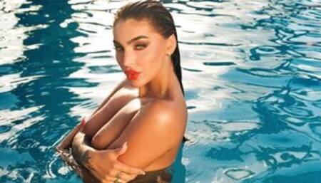 Big ass stunning beauty strips in a pool