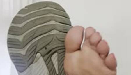 Stinky feet no socks out of sneakers after a jog