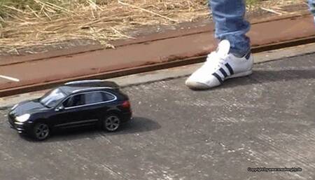 toy car crush in adidas aditrack white sneakers