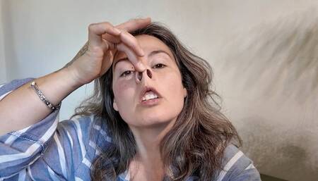 silly face with piggy nose and big crossed eyes m0