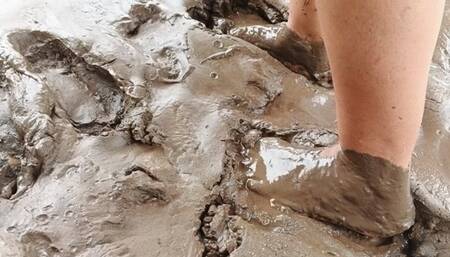 Walking through a lot of mud with their bare feet (3)
