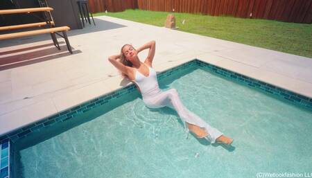 Jasmine gets Wet in a White Jumpsuit and Heels