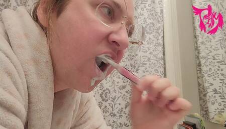 Tooth brushing and tongue scrubbing from profile view