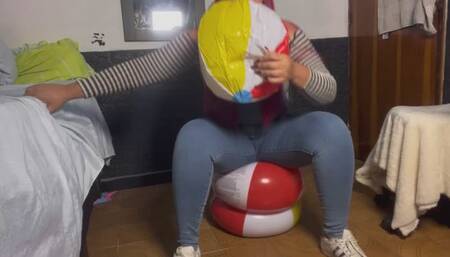 Join me as I blow beach balls while I bounce on two beach balls