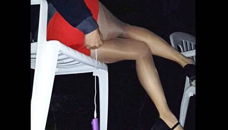 Young asian crossdresser in tight red short skirt first penetrated by anal vibrating dildo and orgasms on a public park