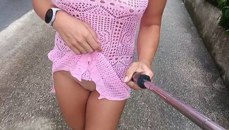 a public walk around the city without underwear in a transparent dress