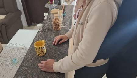 A stepdaughter is surprised while having breakfast