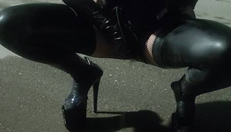 Peeing in the street in latex