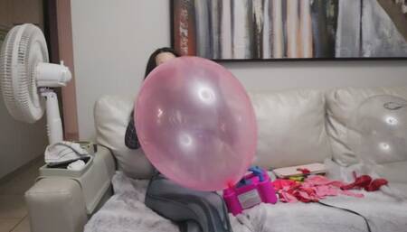 Owllete blows up balloons in venom suit