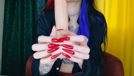 Red sharp long nails. Nail fetish shows on dildo.