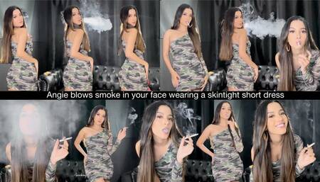 Angie blows smoke in your face wearing a skintight short dress
