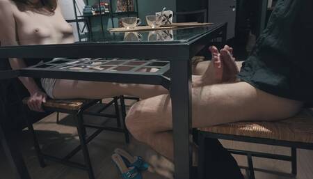 Petite girl with beautiful boobs doing hot footjob under the table