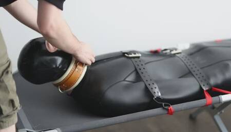 Twink strapped into the neoprene sack and edged relentlessly