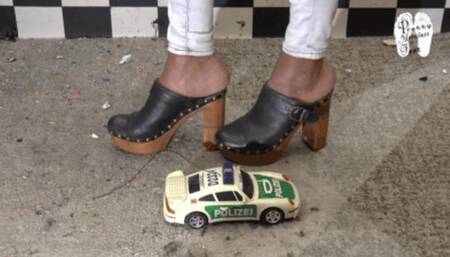 RC-Car under hard wooden Clog