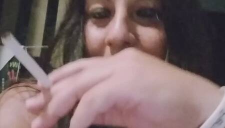 Smoking and drinking in a dark goth mode