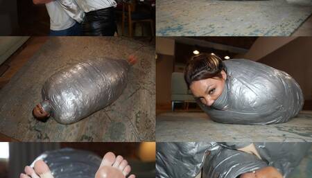 A thick duvet and duct tape mummification cocoon for rara curves (wmv)