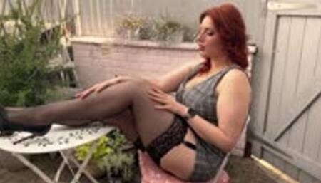 Adjusting Stockings & Suspenders In The Garden - An Outdoor Nylon Tease