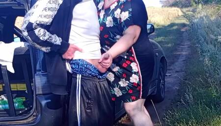 Stepmom holds my dick while I pee and then sucks it in public