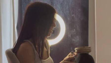 LOVE RED NAILS NOSE EXHALES SMOKE