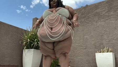 Goddess Claudia Showing Off In a Tiny Bikini