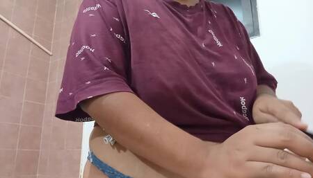 Chubby mother-in-law in the kitchen in underwear