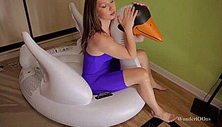Angie popping the big inflatable swan **4K**