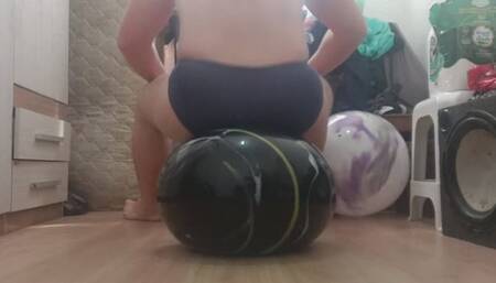 100kg, 220lbs sitting bouncing and popping big soft balls