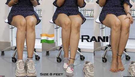Indian Goddess Rani takes off socks and shoes after a long walk